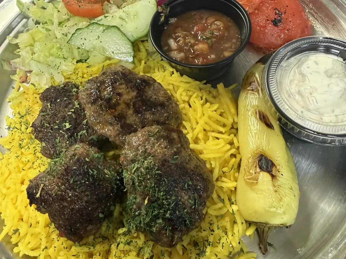 Kofta kabob at Kaboblicious: seasoned beef kofta over saffron rice with mixed salad, grilled tomato and banana pepper