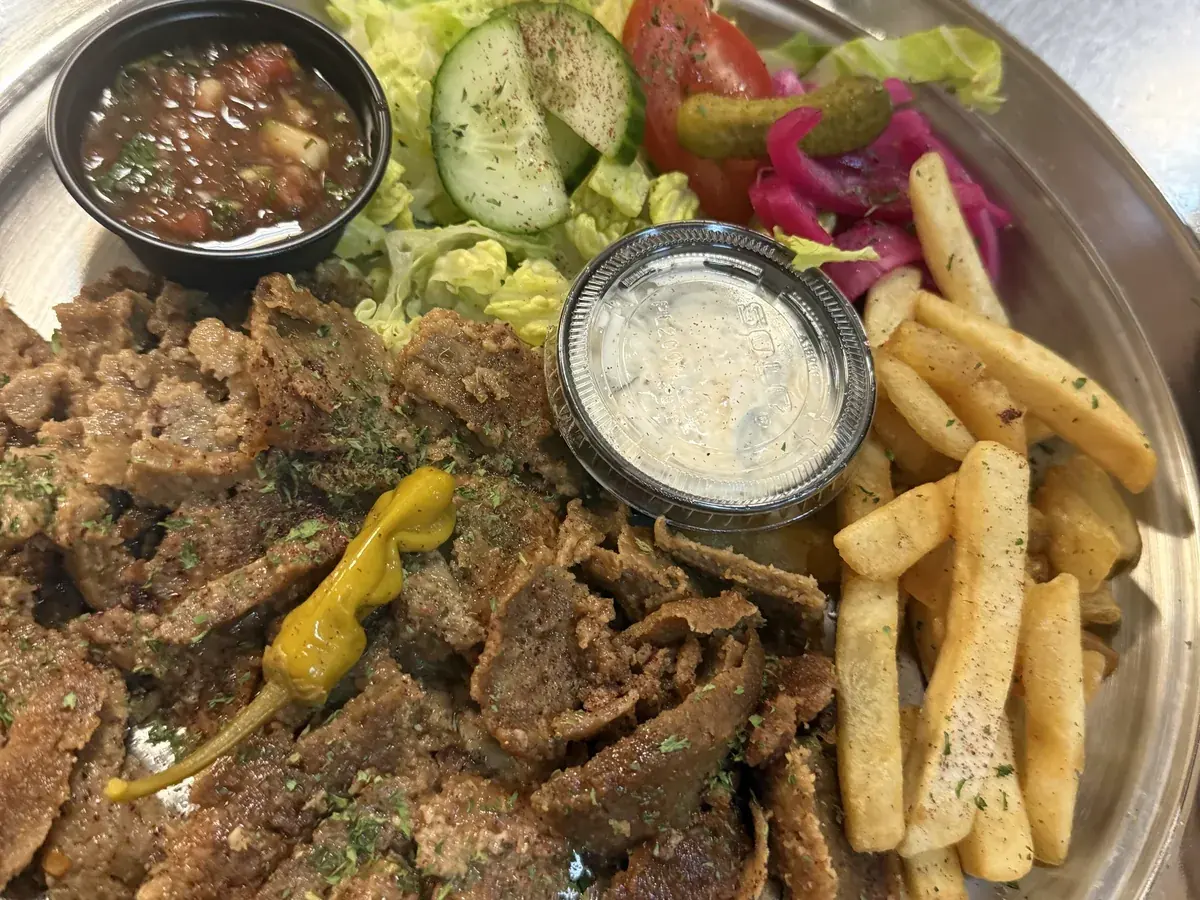 Lamb doner platter at Kaboblicious: slow carved lamb with seasoned fries, mixed salad and vinegar onions